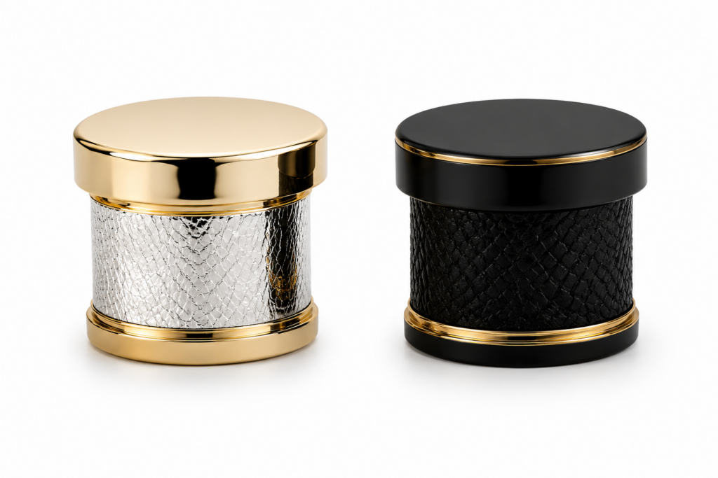 Gold and black perfume caps with textured decorative finishes