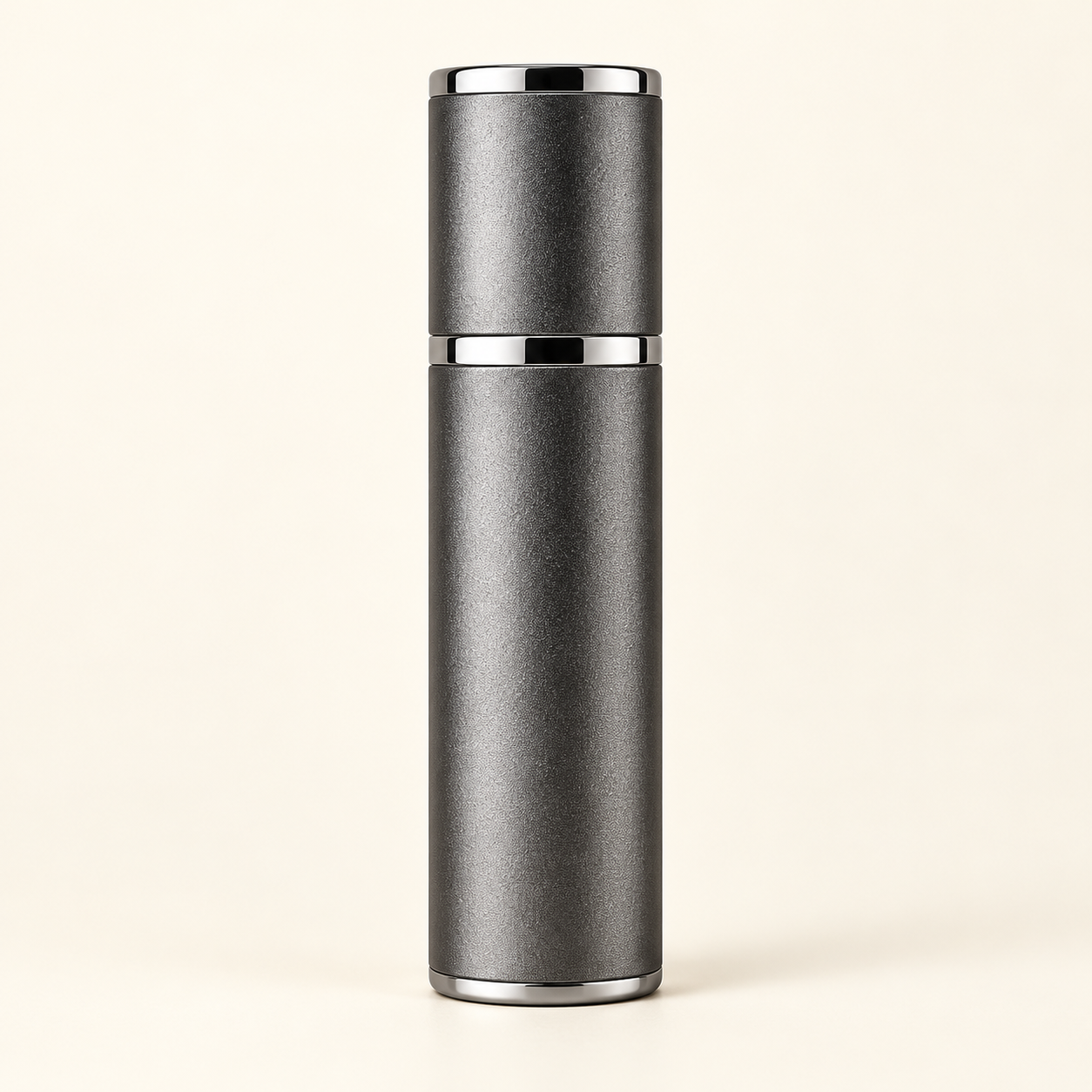 Silver-textured cylindrical travel perfume atomizer