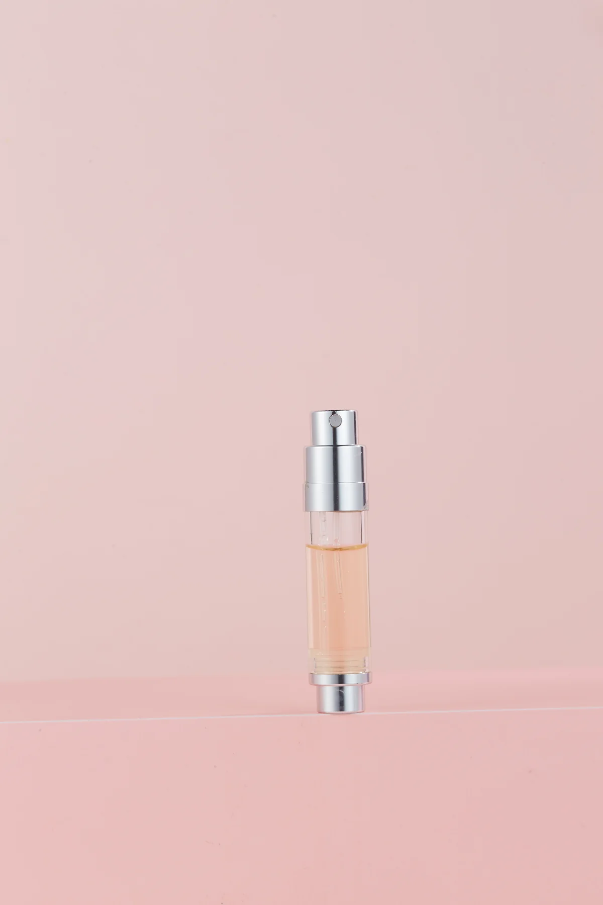 Transparent perfume atomizer inner vial